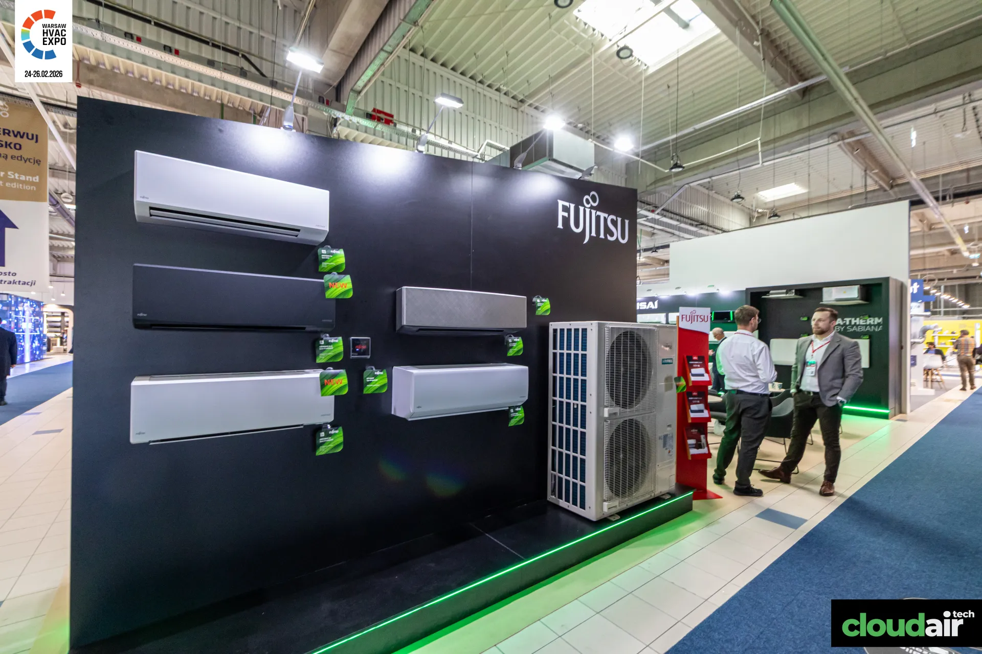 Fujitsu black display wall with wall-mounted split units and outdoor unit at Warsaw HVAC Expo 2026