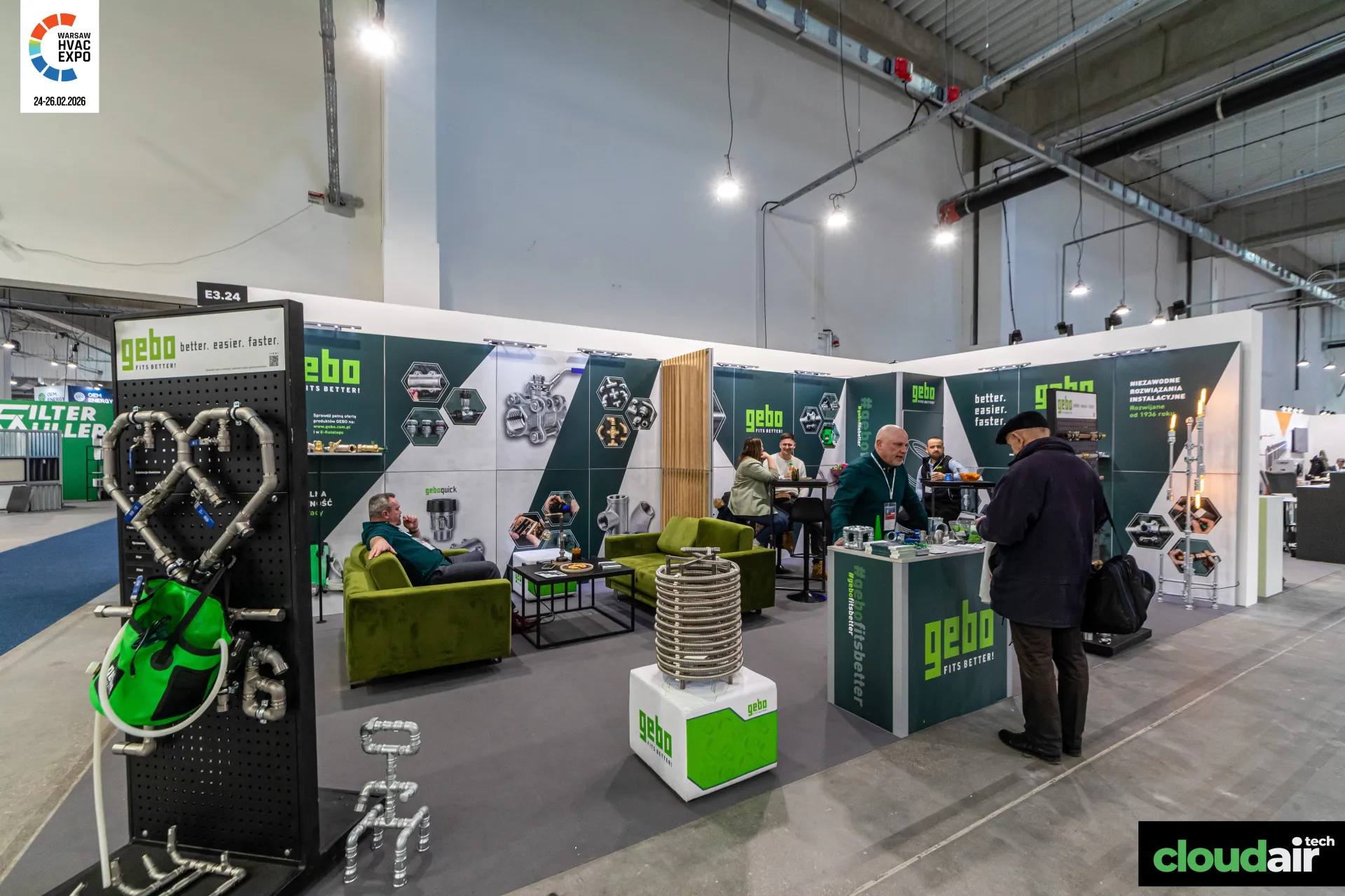 Gebo stand with heart-shaped pipe display and lounge sofas at Warsaw HVAC Expo 2026