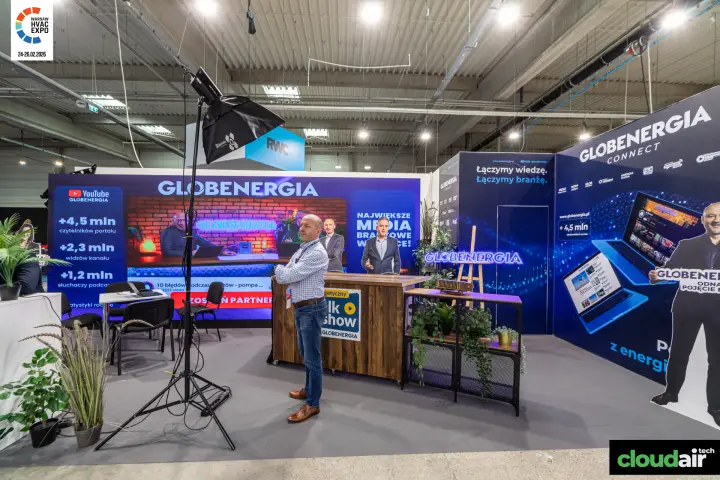 Globenergia stand with audience figures wall and talk show desk at Warsaw HVAC Expo 2026