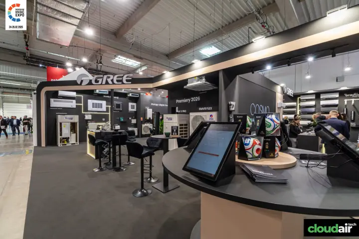 Gree stand seen from a tablet counter with Premiery 2026 units behind at Warsaw HVAC Expo 2026