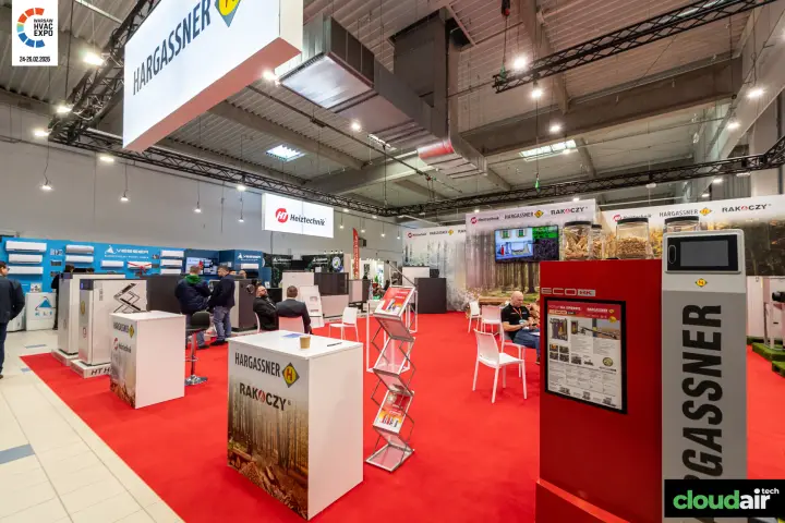 Hargassner Eco HK boiler display with wood fuel samples at Warsaw HVAC Expo 2026
