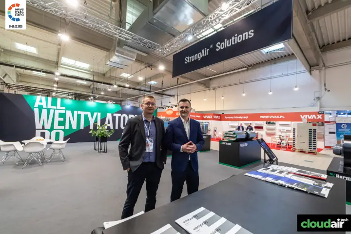 Harmann staff by the 'wentylatory' brochures with a Pirax CPA fan behind at Warsaw HVAC Expo 2026