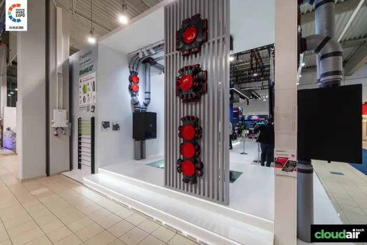 Heatpex display of red-capped distribution boxes and the BioHEAT heating system