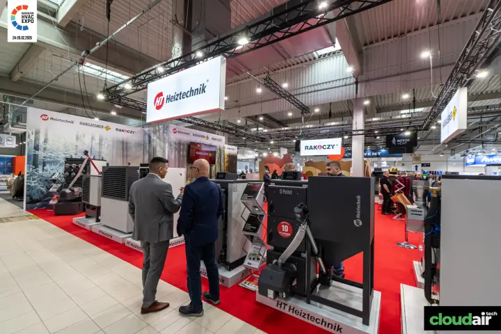 Heiztechnik Q Pellet boiler and heat pump line-up beside the aisle at Warsaw HVAC Expo 2026