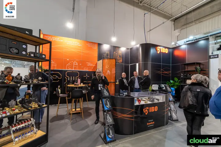 IBO pump stand with black walls and orange graphics at Warsaw HVAC Expo 2026