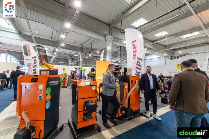 Kipi stand with orange pellet boilers and burner units at Warsaw HVAC Expo 2026