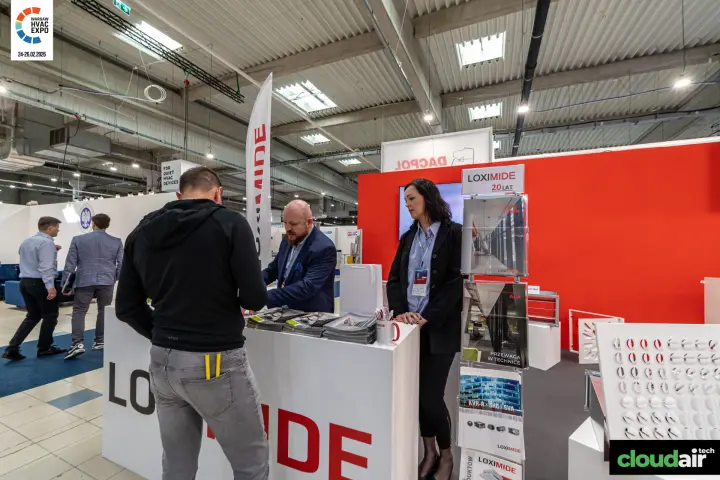 Loximide counter with brochures and swirl diffuser samples at Warsaw HVAC Expo 2026