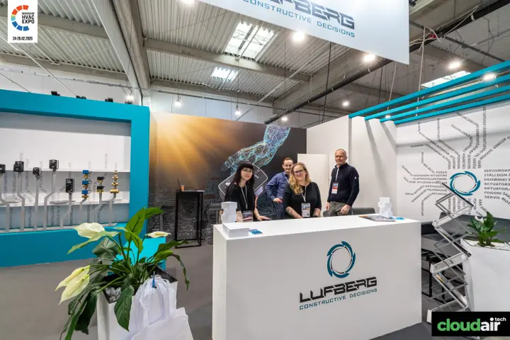 Lufberg stand with actuator display wall and white logo counter