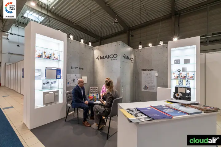 Maico Poland stand with concrete-effect walls and lit product niches