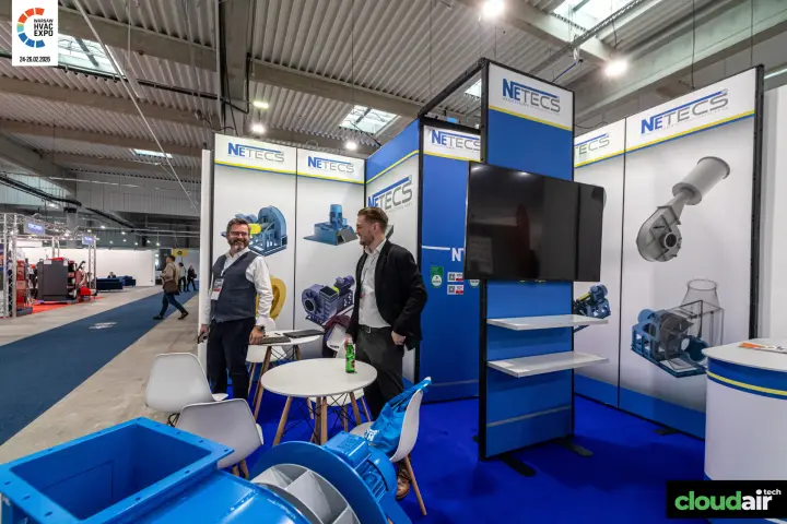 Netecs industrial fan stand with a blue centrifugal fan in front at Warsaw HVAC Expo 2026