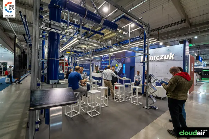 Niczuk stand built around blue pipework on steel mounting rails at Warsaw HVAC Expo 2026