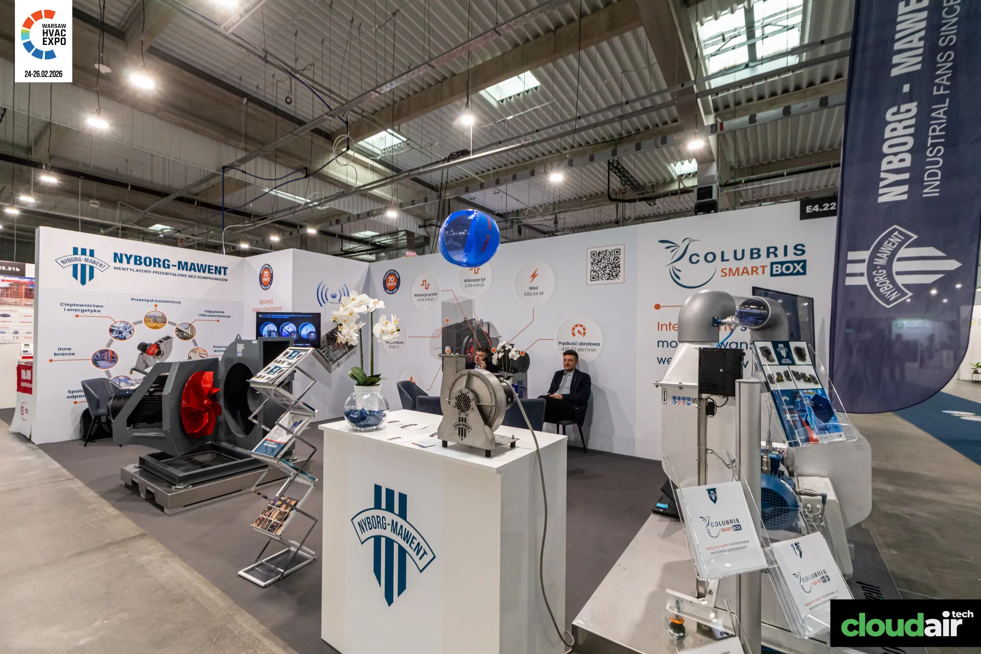 Nyborg-Mawent stand from the aisle with branded flag and blower at Warsaw HVAC Expo 2026