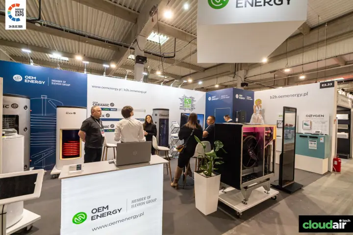 OEM Energy stand with cutaway hot water cylinders and an uncased outdoor unit at Warsaw HVAC Expo 2026