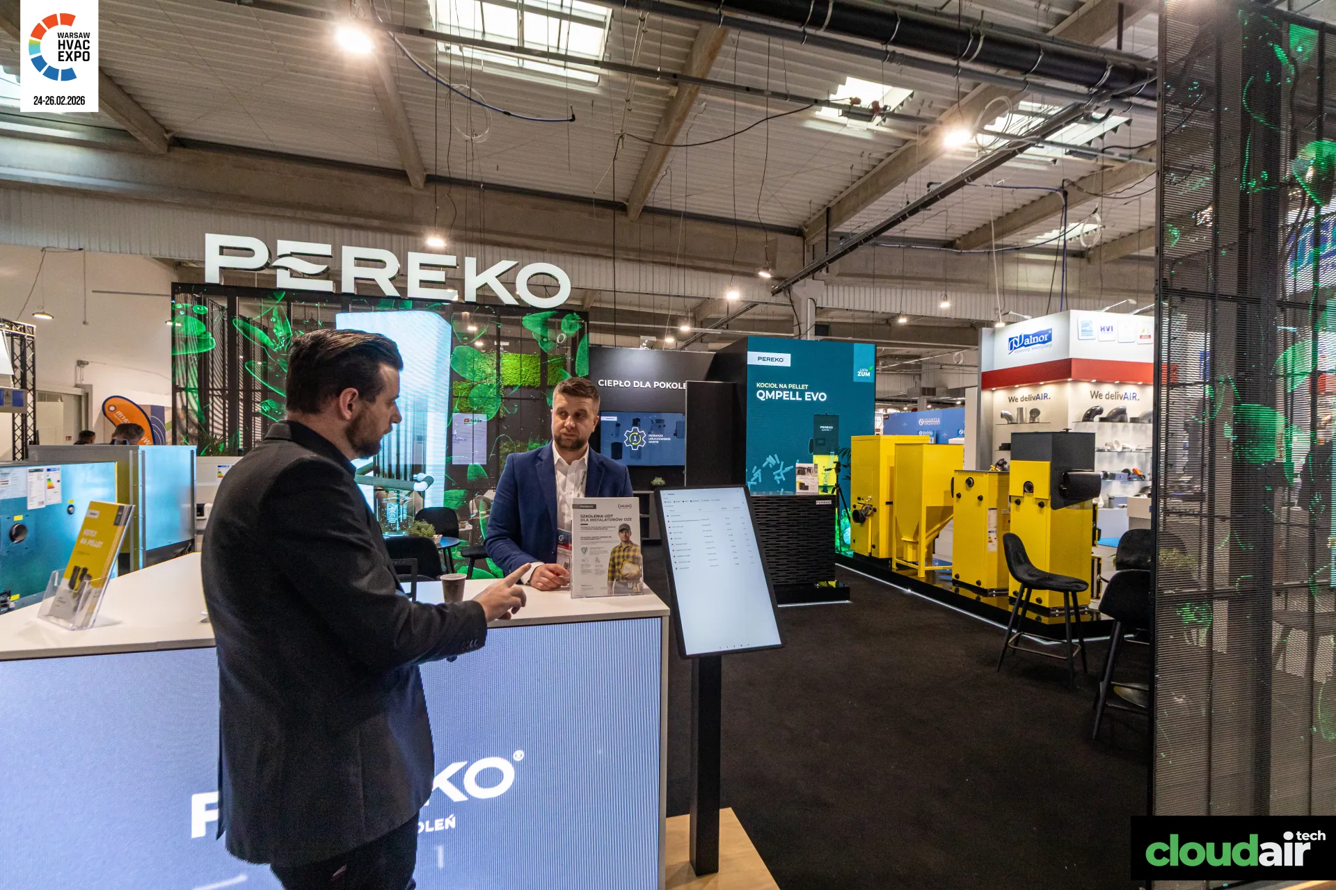 Pereko stand with QMPELL EVO pellet boiler signage and LED counter at Warsaw HVAC Expo 2026