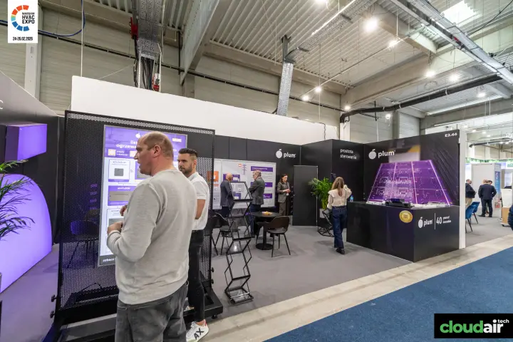 Plum controls stand with purple circuit board graphic at Warsaw HVAC Expo 2026