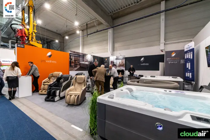 Prowellness stand with a running hot tub and massage chairs