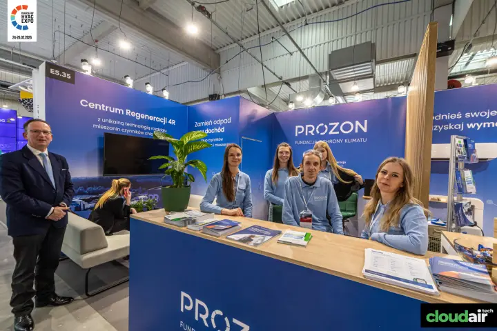 Prozon stand E5.35 with staff at the wooden reception counter at Warsaw HVAC Expo 2026