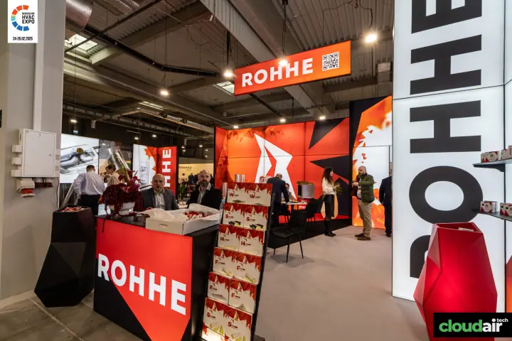 Rohhe stand entrance with backlit logo tower and product box rack at Warsaw HVAC Expo 2026