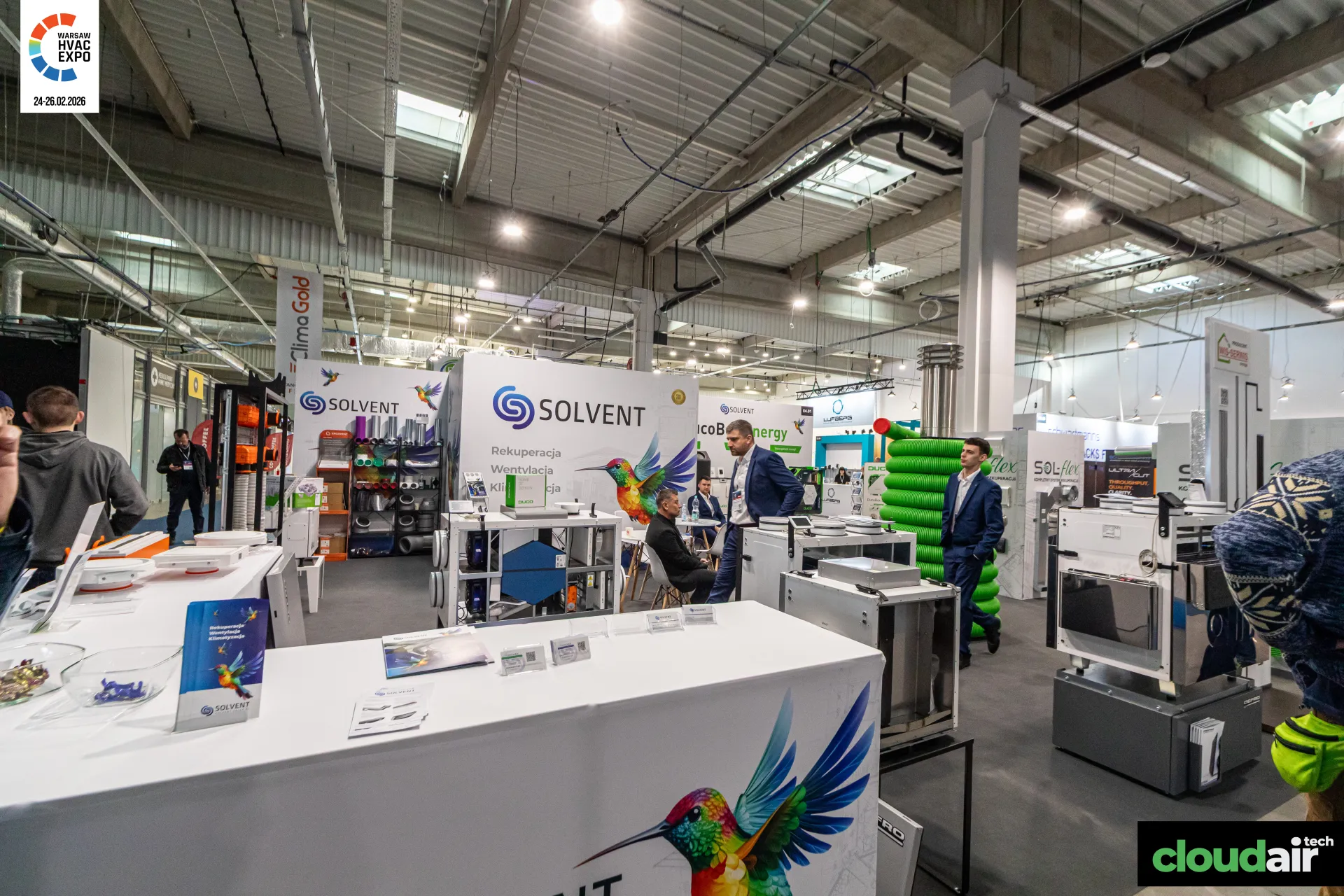 Solvent stand with heat recovery units and green flexible ducting at Warsaw HVAC Expo 2026