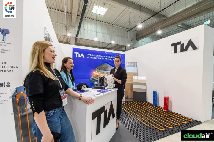 TIA side wall logo and serpentine floor heating pipe layout at Warsaw HVAC Expo 2026
