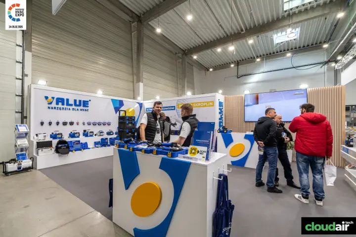 Value tool wall with gauges, vacuum pumps and a logo-shaped counter at Warsaw HVAC Expo 2026