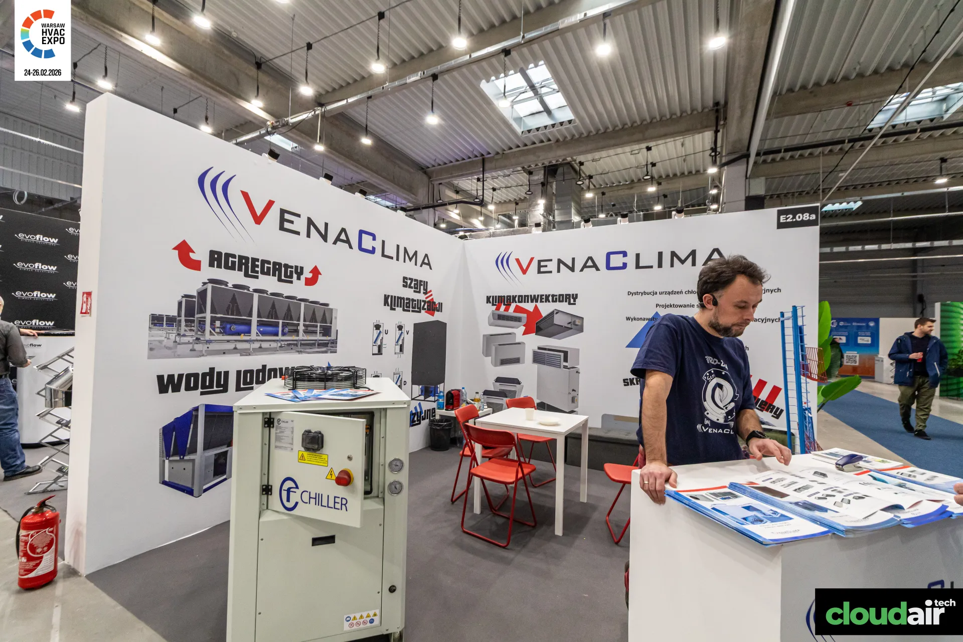 VenaClima stand with a compact chiller and fan coil graphics at Warsaw HVAC Expo 2026