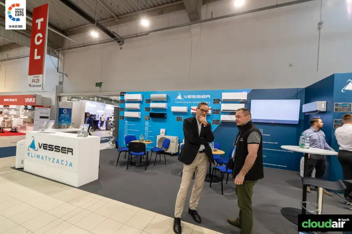 Vesser reception counter with wall of split air conditioners at Warsaw HVAC Expo 2026