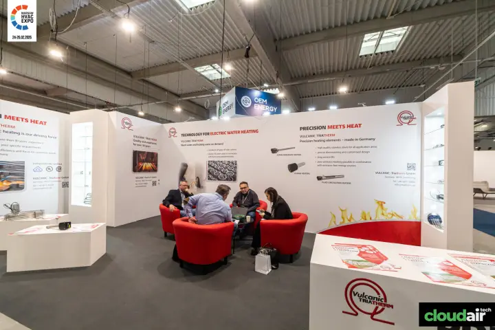Vulcanic Triatherm stand with electric heating elements and red lounge chairs