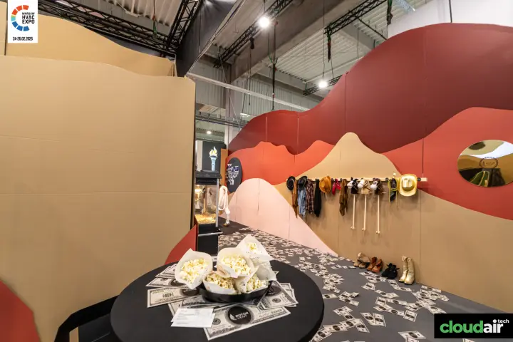 Western props and popcorn inside the Rotor Vent stand at Warsaw HVAC Expo 2026