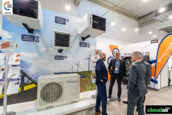 Winterwarm unit heaters and an outdoor heat pump on a landscape wall at Warsaw HVAC Expo 2026