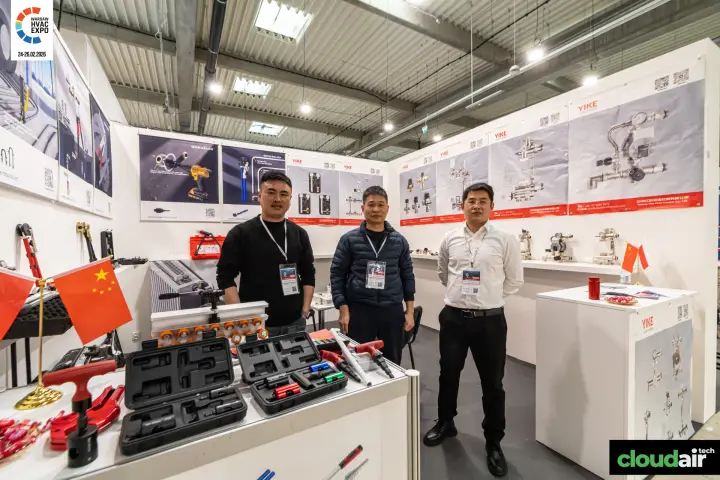 Yike and Rainluck stand with manifolds, mixing valves and pipe tool kits at Warsaw HVAC Expo 2026