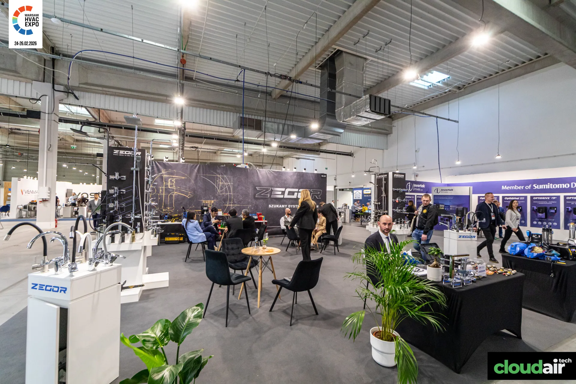 Zegor stand with kitchen taps, shower columns and a central meeting area at Warsaw HVAC Expo 2026